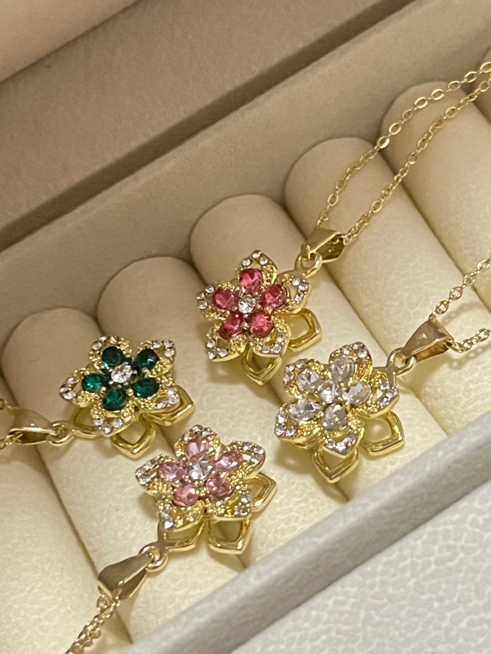 Gold Coated Stainless Steel Rotating Flower Necklace with Zircon Stones